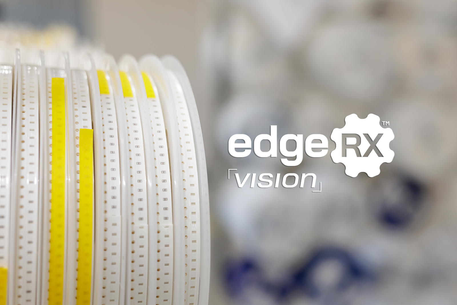 smd_reel_vision_white_web Image of SMD capacitors on reels with the edgeRX™ Vision logo applied.